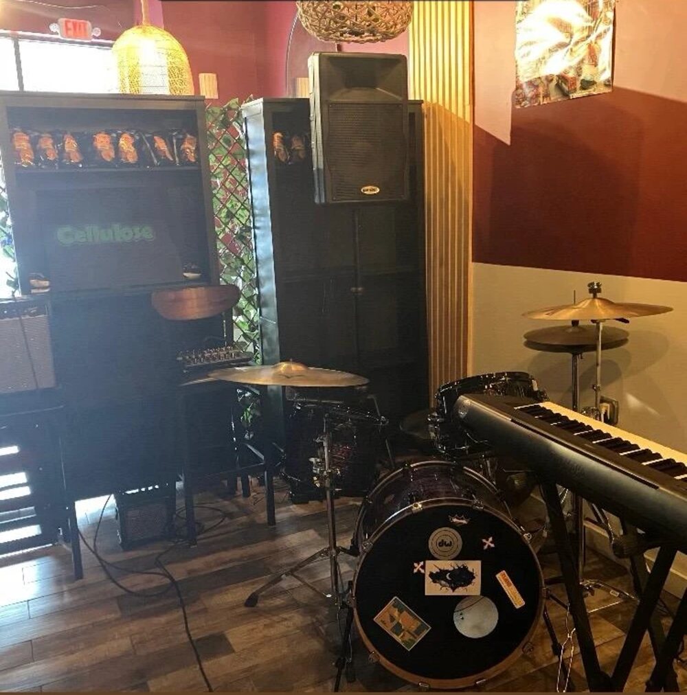 Drums and keyboard set up for open mic night